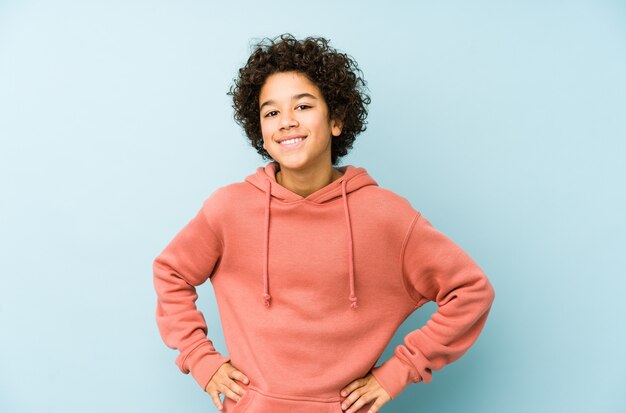 African american little boy isolated confident keeping hands on hips.