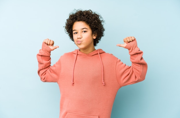 African american little boy isolated feels proud and self confident, example to follow.