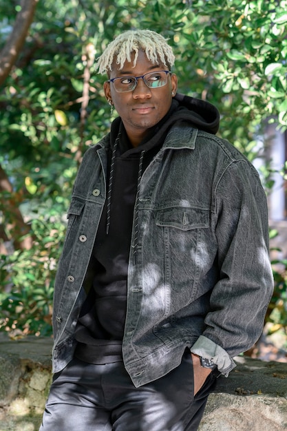 African american man in denim jacket at the street lifestyle portrait of happy man