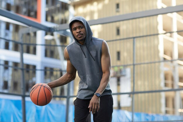 African-American Man Dribbling Ball