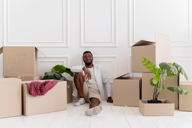 African american man getting ready his new home to move in