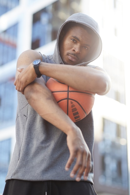 African-American Man Posing with Basketball Ball