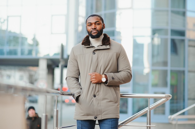 African American man in stylish new clothes on the street