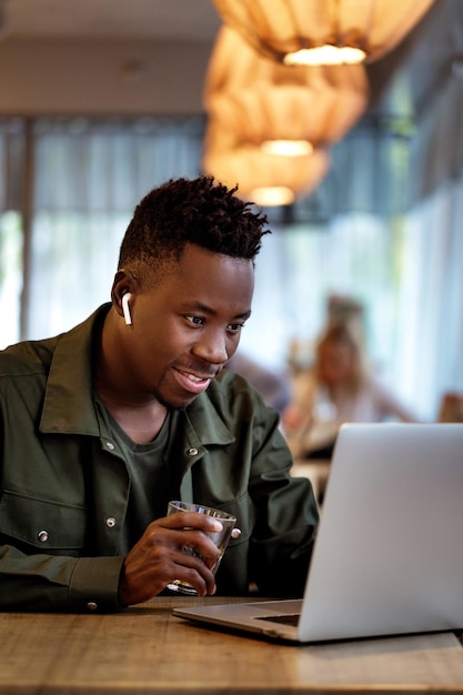 African american man using computer