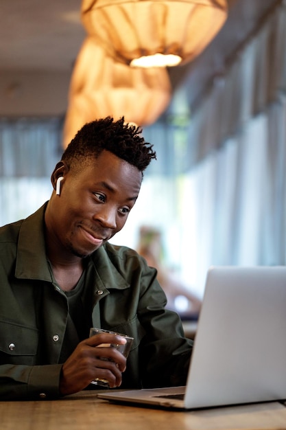 African american man using computer