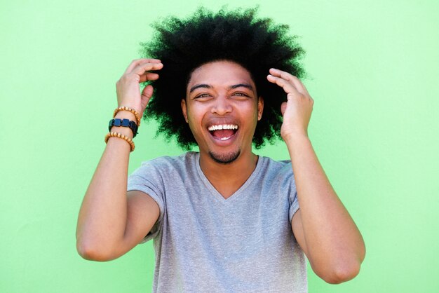 African american man with afro laughing