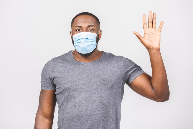 African american man with mask to protect him from Coronavirus. Coronavirus pandemic. Covid-19.