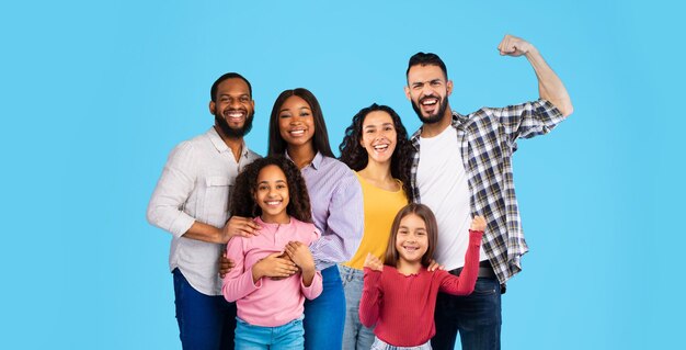 African american and middle eastern families on blue\
collage