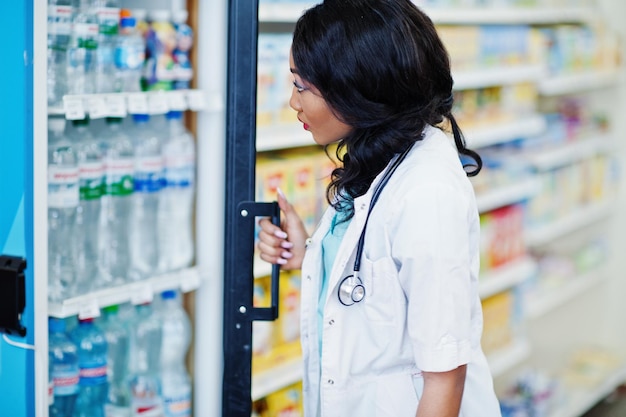 African american pharmacist working in drugstore at hospital pharmacy African healthcare