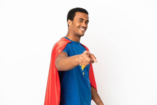 African American Super Hero man over isolated white background points finger at you with a confident expression