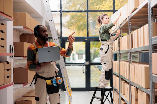 African american supervisor checking goods logistics