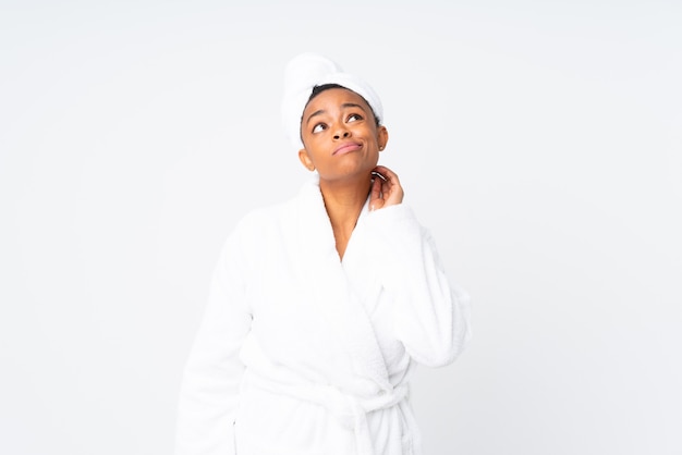 African american woman  in a bathrobe thinking an idea