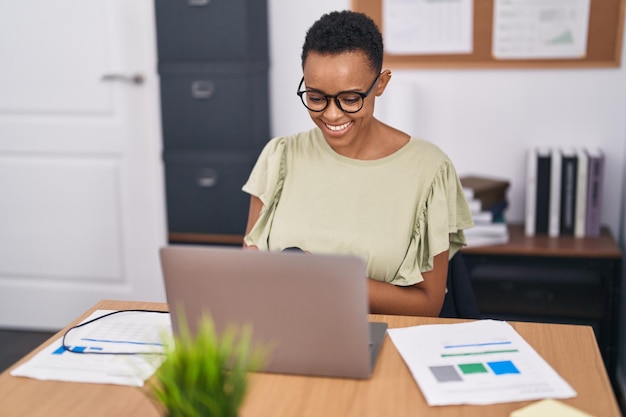 African american woman business worker using laptop working at office