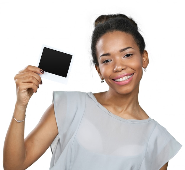 African american woman holding blank paper