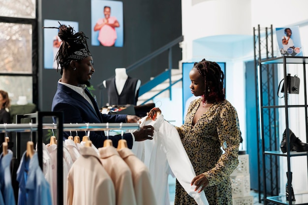 African american woman shopping for pregnancy clothes