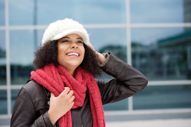 African american woman smiling in winter clothes