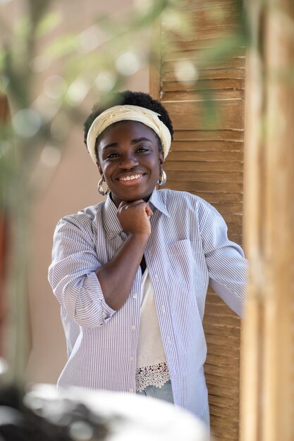 African american woman standing near the window