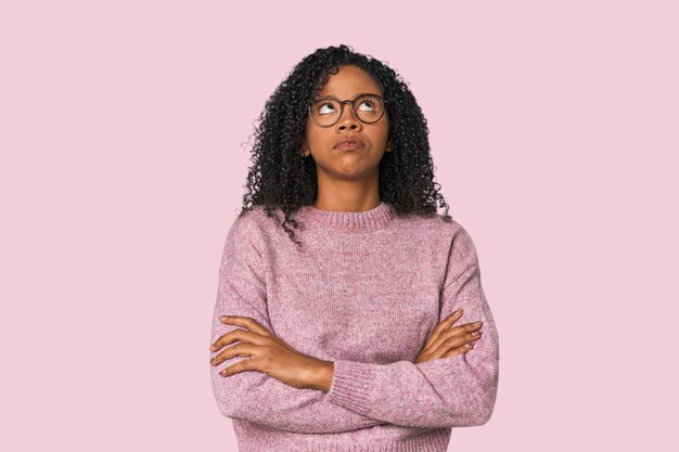 African American woman in studio setting tired of a repetitive task