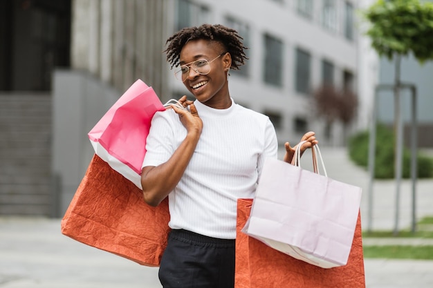 Premium Photo | African american woman wearing casual clothes enjoying ...