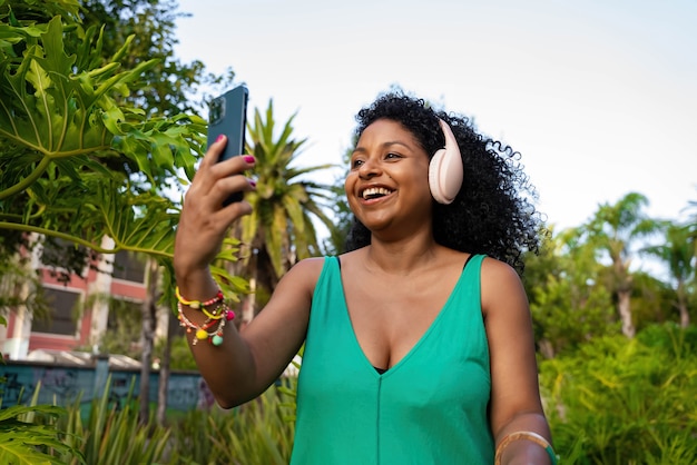 African american woman with video call