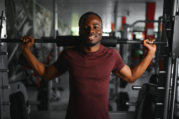 African American young man doing workout at the gym