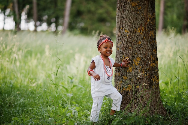 African baby girl walking at park