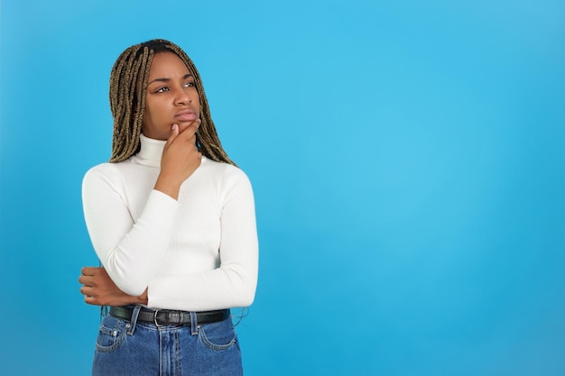 African beauty thoughtful woman standing and gesturing concern