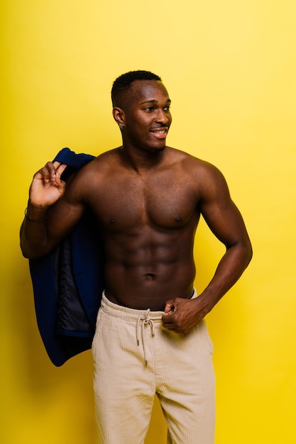 African black man model in blue suit topless studio background