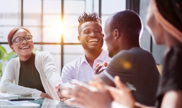 African business people handshake at modern office