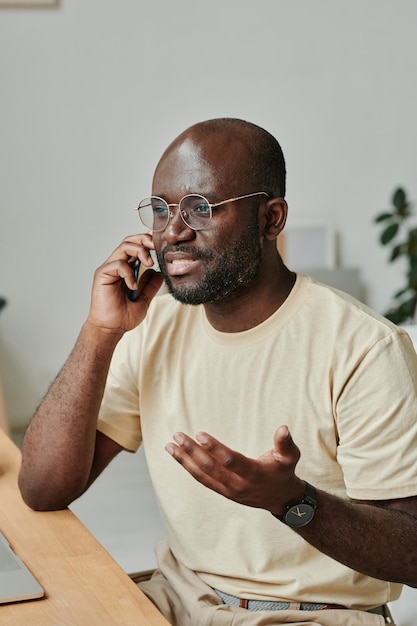 African businessman busy on the phone