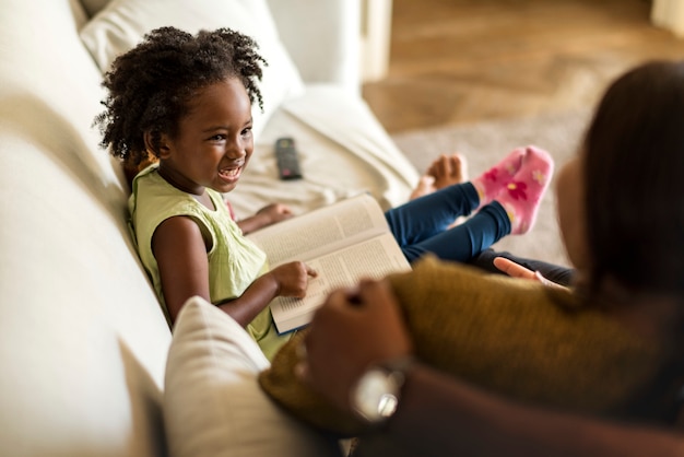 African child playing with her parents