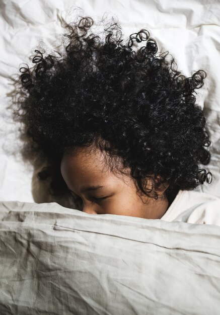 Photo african child sleeping