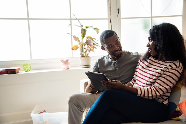 African couple working on tablet