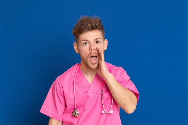 African doctor wearing a pink uniform