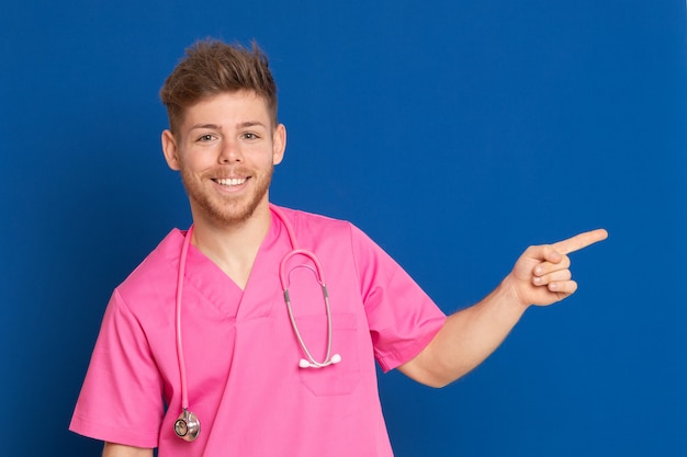 African doctor wearing a pink uniform