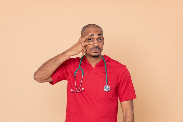 African doctor wearing red uniform