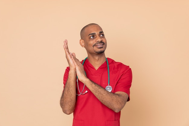 African doctor wearing red uniform