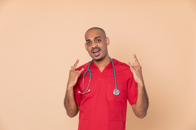 African doctor with red uniform