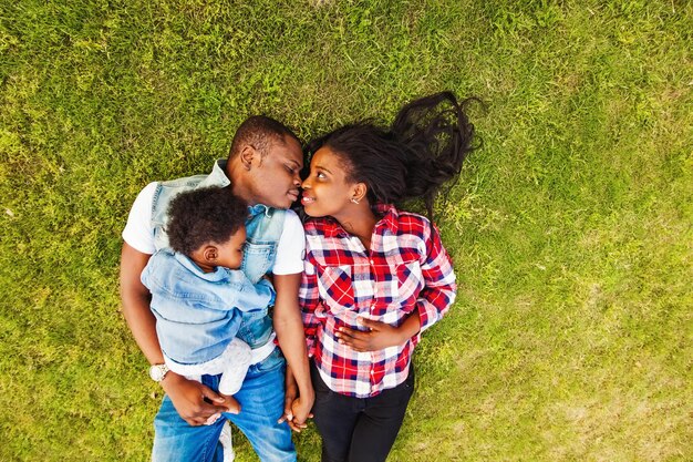 African family lying on the grass