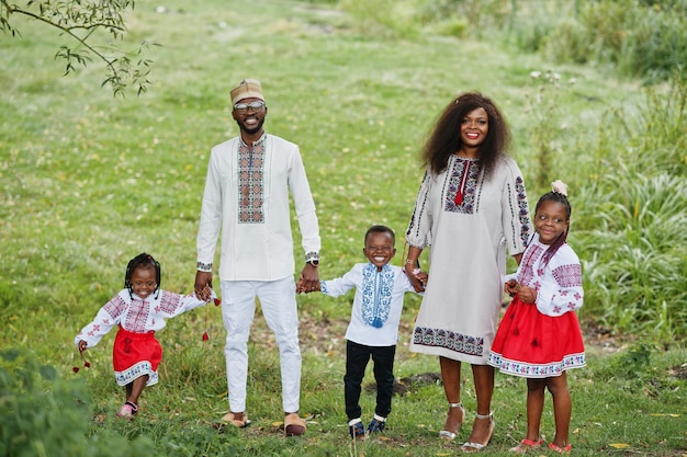 African family in traditional clothes at park