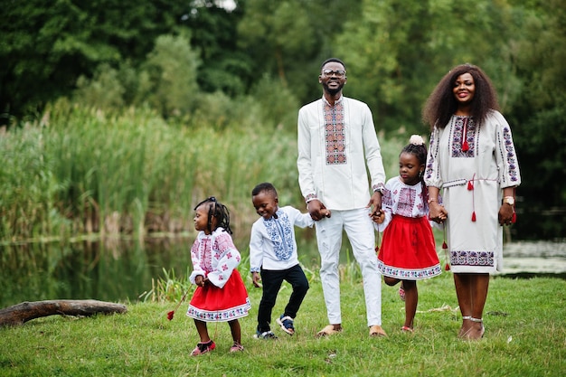 African family in traditional clothes at park