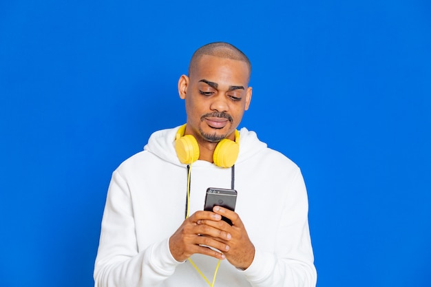 African guy wearing a white sweatshirt