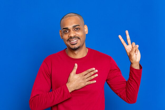 African guy with red sweatshirt