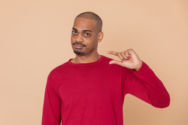 African guy with a red sweatshirt