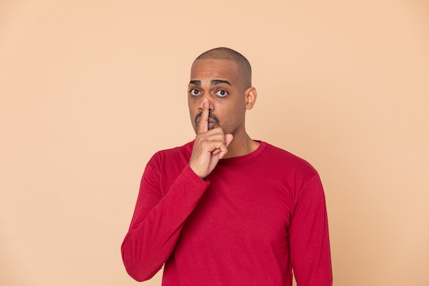 African guy with a red sweatshirt