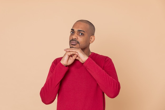 African guy with a red sweatshirt