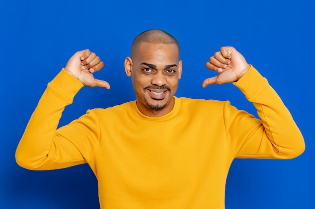 African guy with a yellow jersey