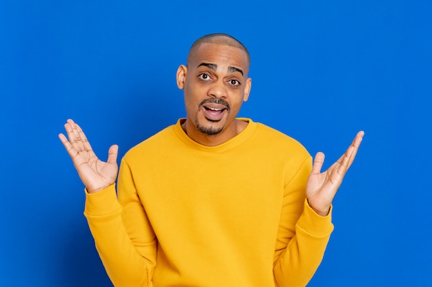 African guy with a yellow jersey