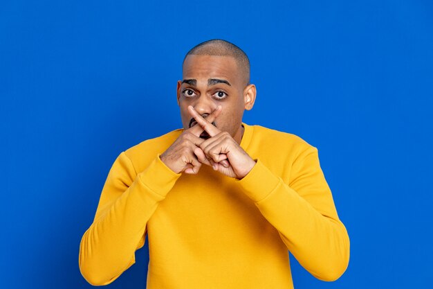 African guy with a yellow jersey