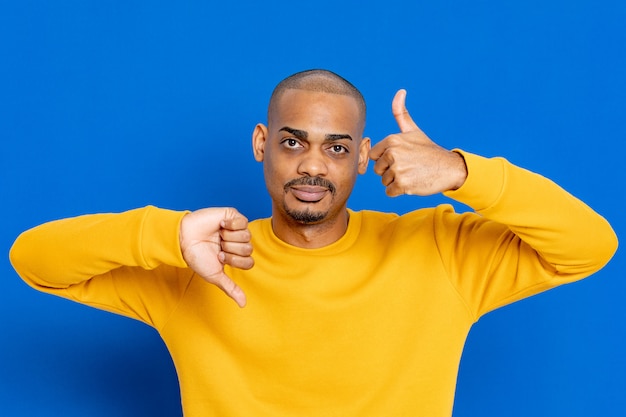 African guy with yellow jersey